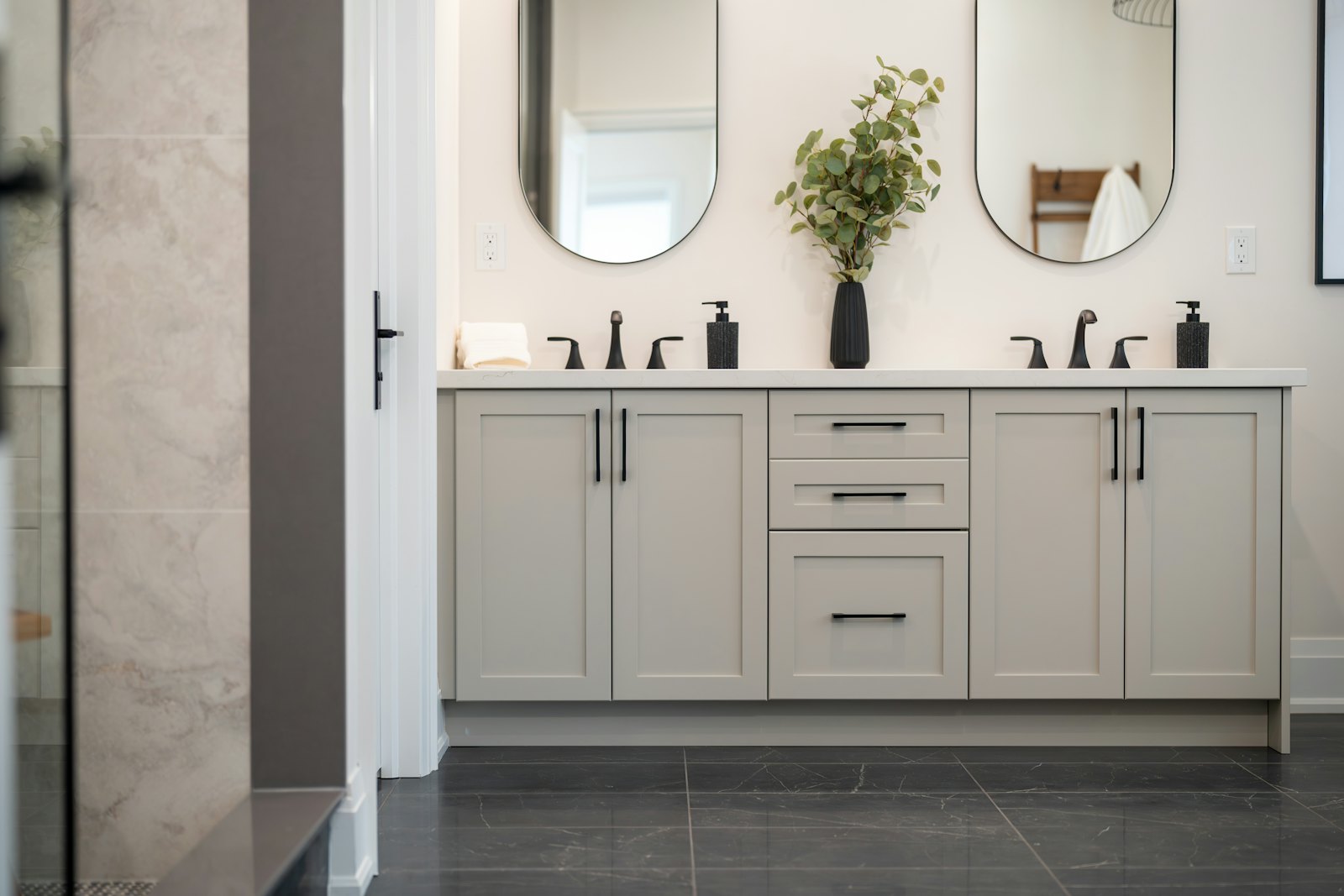 Renovated modern bathroom with tile and glass shower