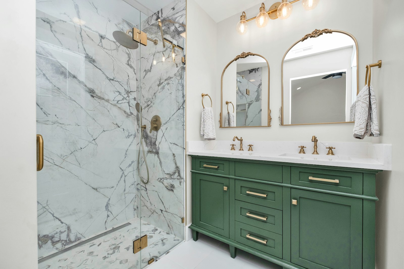 Modern remodeled bathroom with frameless glass shower