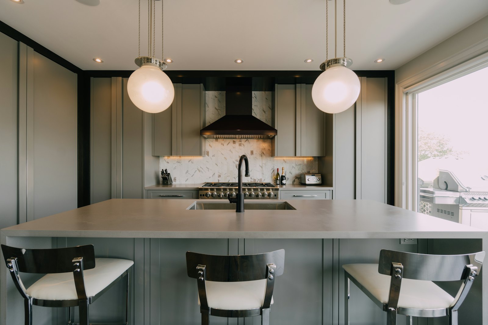 Modern remodeled kitchen with island and custom cabinets