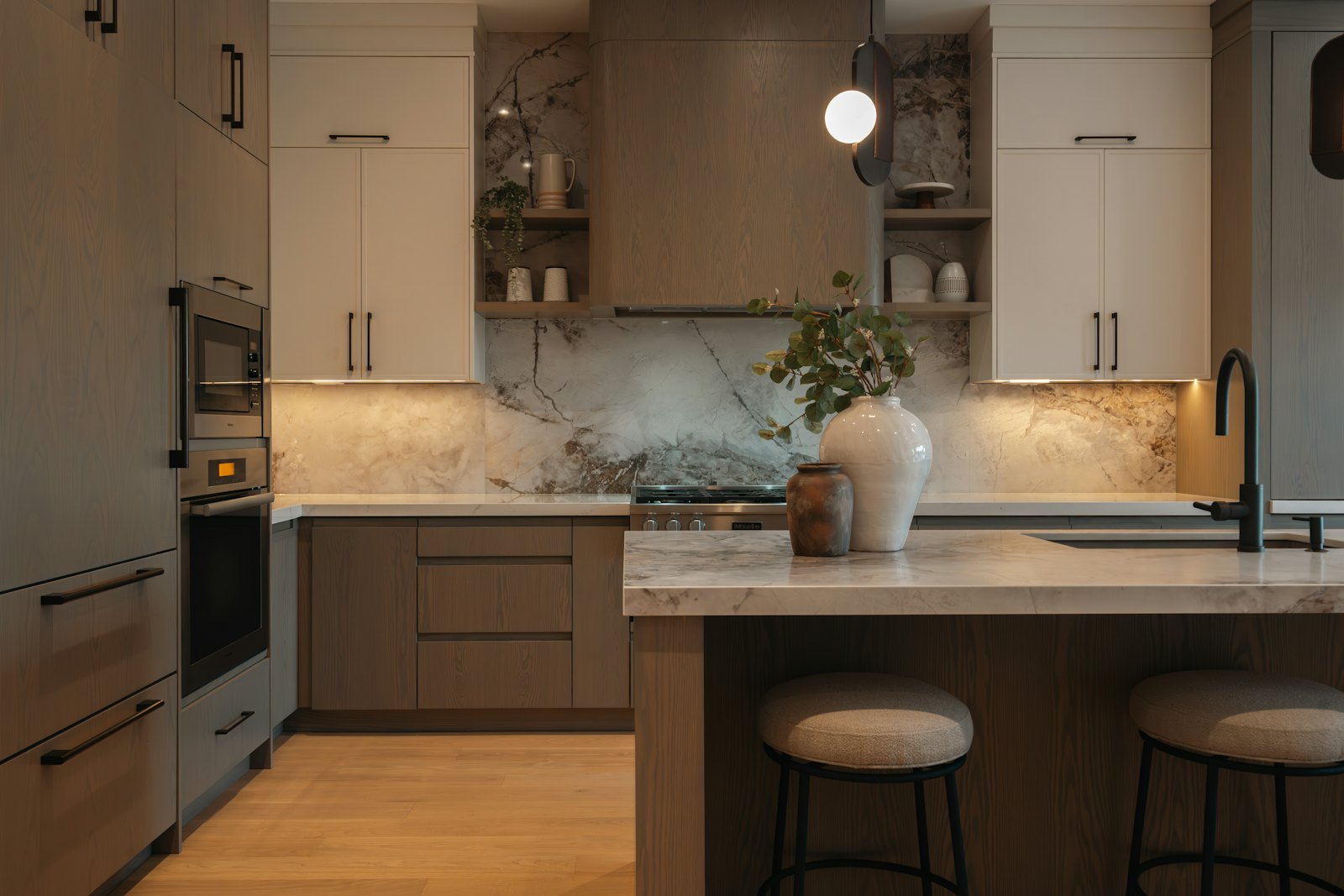 Modern kitchen with island, custom cabinets and quartz countertops